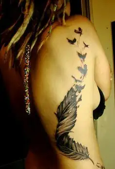 Beautiful Feather Tattoo on Ribs