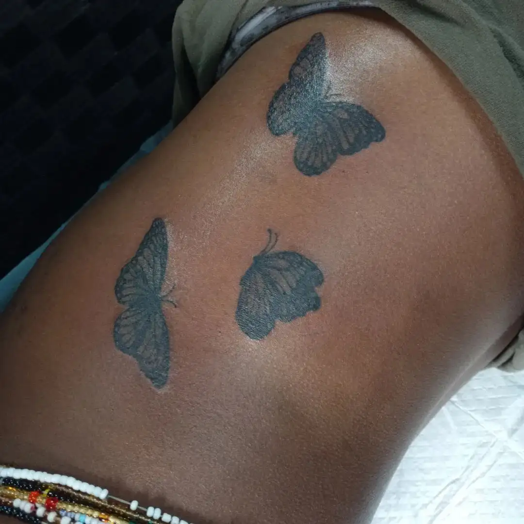 Butterfly Rib Cage Tattoo