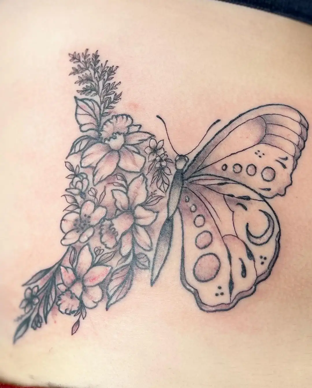 Half Butterfly and Half Flowers Tattoo on Ribs